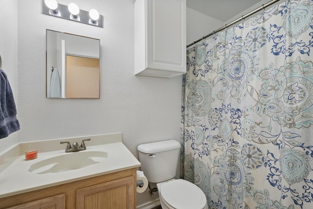 712 Riverflat Dr, Fort Worth, TX 76179 - full bathroom featuring vanity, toilet, and a shower with shower curtain