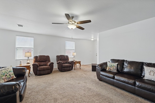 712 Riverflat Dr, Fort Worth, TX 76179 - carpeted living room featuring visible vents, baseboards, and ceiling fan