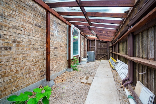 5624 Big River Dr, The Colony, TX 75056 - view of home's exterior featuring cooling unit and brick siding