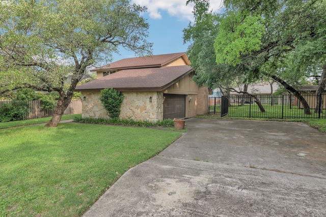 7804 Skylake Dr, Fort Worth, TX 76179 - view of front facade with concrete driveway, fence, stone siding, and a front lawn