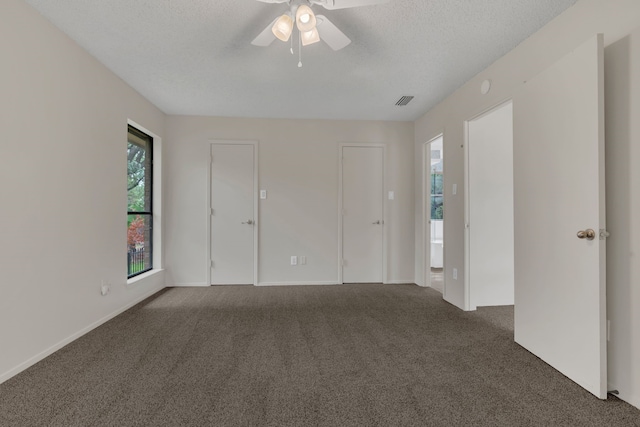 7804 Skylake Dr, Fort Worth, TX 76179 - unfurnished bedroom featuring carpet flooring, a ceiling fan, a textured ceiling, and baseboards