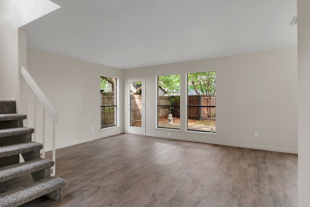 7804 Skylake Dr, Fort Worth, TX 76179 - interior space with baseboards, wood finished floors, and stairway