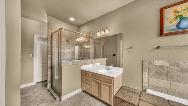 1821 Sandpiper Dr, Weatherford, TX 76088 - full bath featuring a stall shower, tile patterned flooring, and vanity