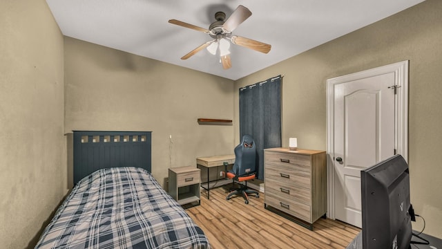1821 Sandpiper Dr, Weatherford, TX 76088 - bedroom with light wood finished floors and ceiling fan
