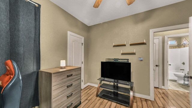 1821 Sandpiper Dr, Weatherford, TX 76088 - interior space with light wood-type flooring, ceiling fan, baseboards, and a desk
