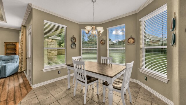 1821 Sandpiper Dr, Weatherford, TX 76088 - dining room featuring a chandelier, crown molding, baseboards, and light tile patterned floors