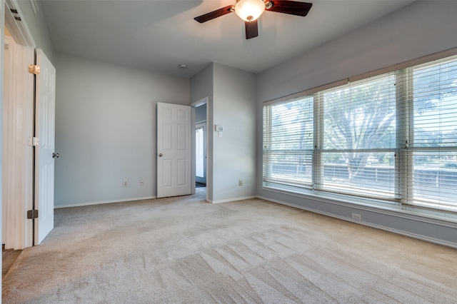 1521 Merritt Dr, Flower Mound, TX 75028 - empty room with ceiling fan, light carpet, and baseboards