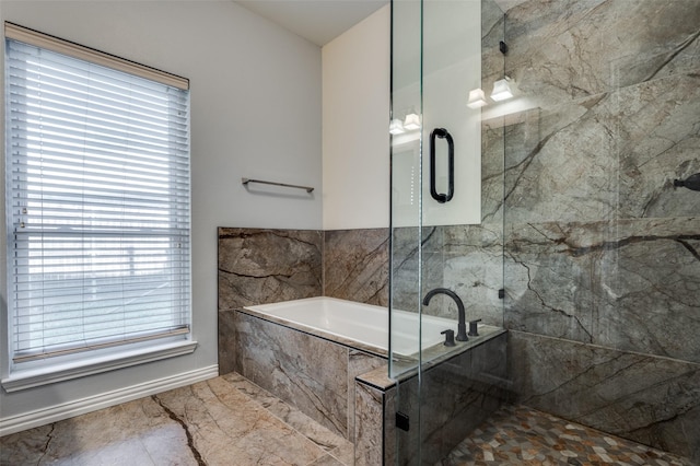 1521 Merritt Dr, Flower Mound, TX 75028 - bathroom with a bath, a marble finish shower, marble finish floors, and healthy amount of natural light