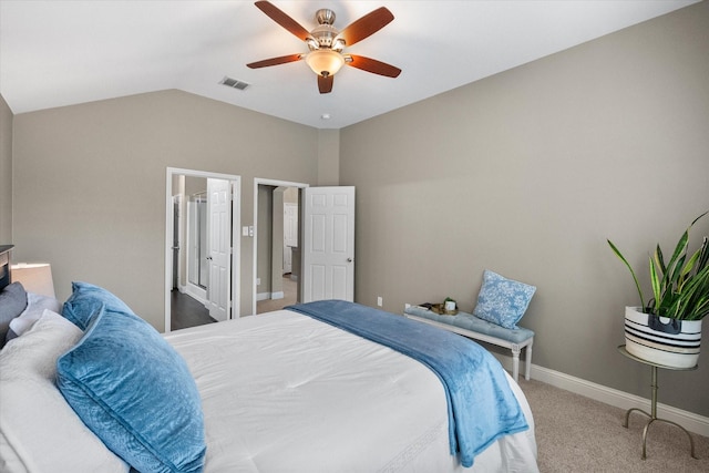 carpeted bedroom with a ceiling fan, baseboards, visible vents, and vaulted ceiling