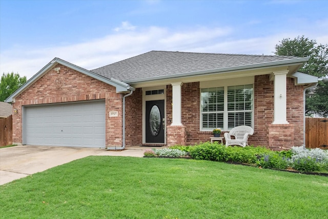 single story home featuring fence, roof with shingles, an attached garage, a front yard, and driveway