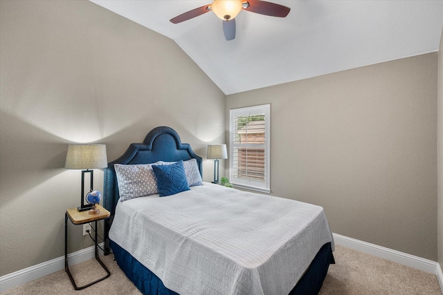 bedroom with baseboards, carpet, and vaulted ceiling