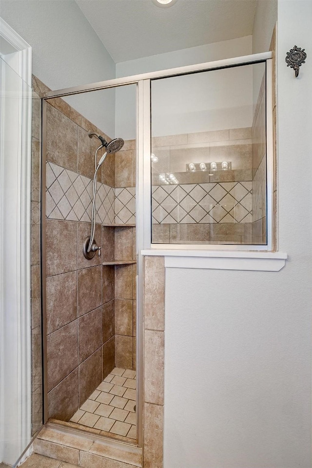 bathroom with a stall shower