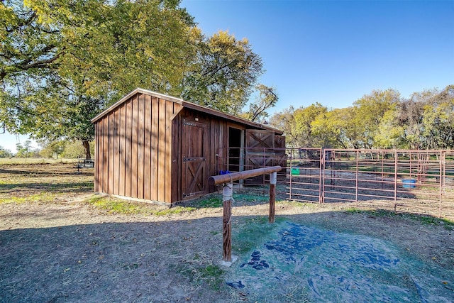 view of outbuilding with an exterior structure and an outbuilding