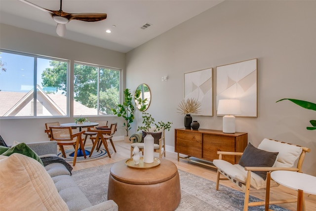 interior space featuring a ceiling fan, recessed lighting, light wood-style flooring, and visible vents