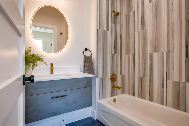 bathroom with vanity and bathtub / shower combination