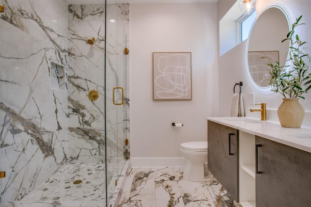 bathroom featuring a sink, toilet, a marble finish shower, marble finish floor, and baseboards