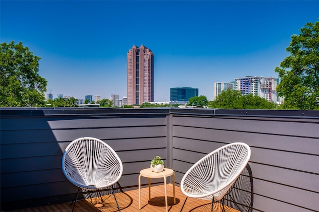 balcony featuring a view of city