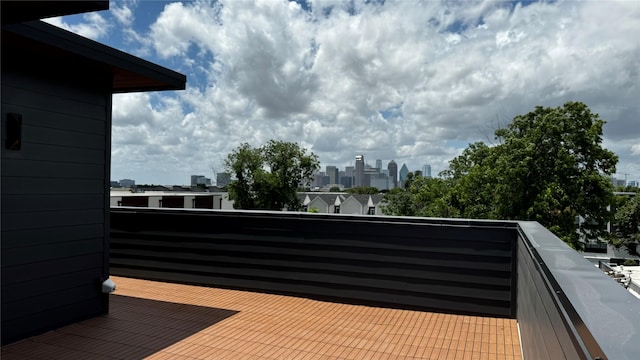 balcony featuring a city view