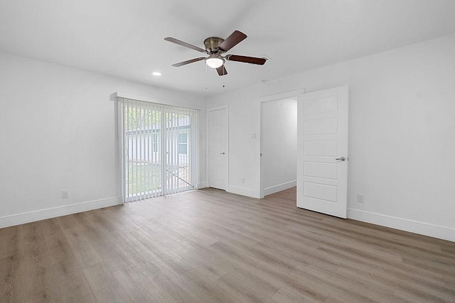 unfurnished bedroom featuring wood finished floors, baseboards, ceiling fan, recessed lighting, and access to outside