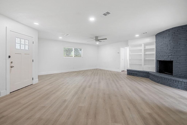 unfurnished living room featuring visible vents, light wood-style floors, baseboards, ceiling fan, and recessed lighting