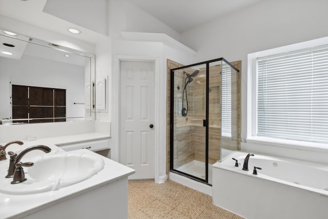 full bathroom featuring vanity, a stall shower, recessed lighting, and a garden tub