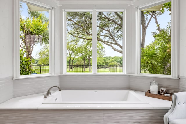 bathroom with a garden tub