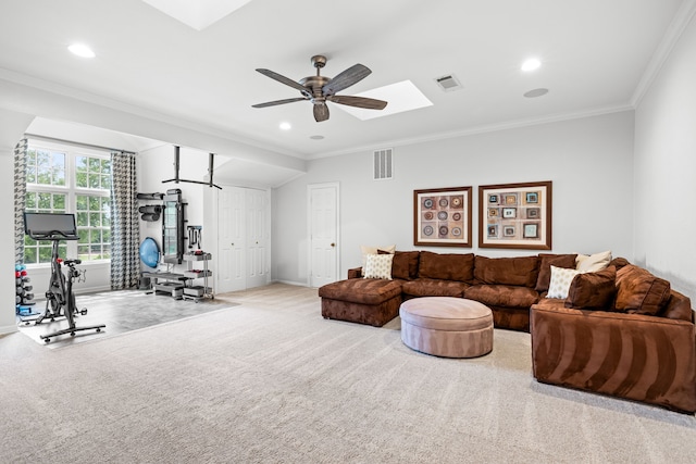 living area with crown molding, ceiling fan, a skylight, and visible vents