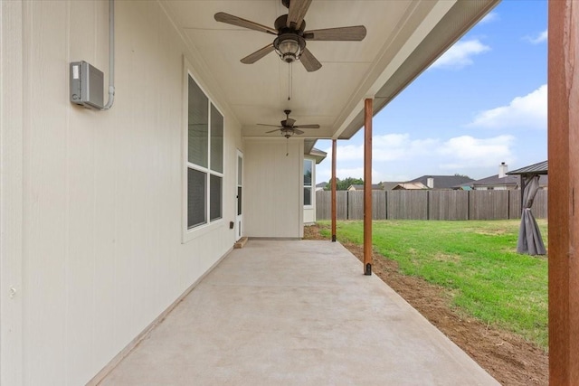 view of patio featuring ceiling fan and a fenced backyard