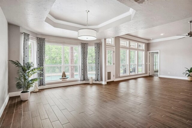 7312 Bishop Ct, Fort Worth, TX 76179 - carpeted empty room with a ceiling fan, baseboards, a tray ceiling, and a smoke detector