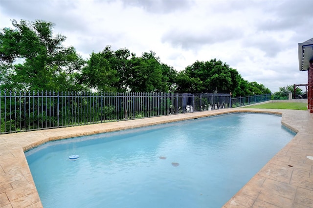 view of swimming pool featuring a fenced in pool and a fenced backyard