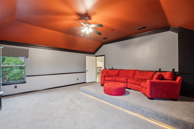 home theater room with visible vents, a ceiling fan, carpet floors, and lofted ceiling