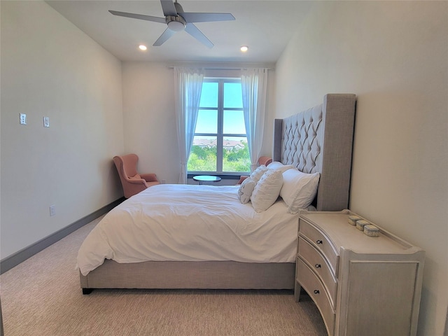 bedroom featuring recessed lighting, ceiling fan, light carpet, and baseboards