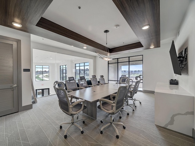 office area with baseboards, carpet, and a wealth of natural light