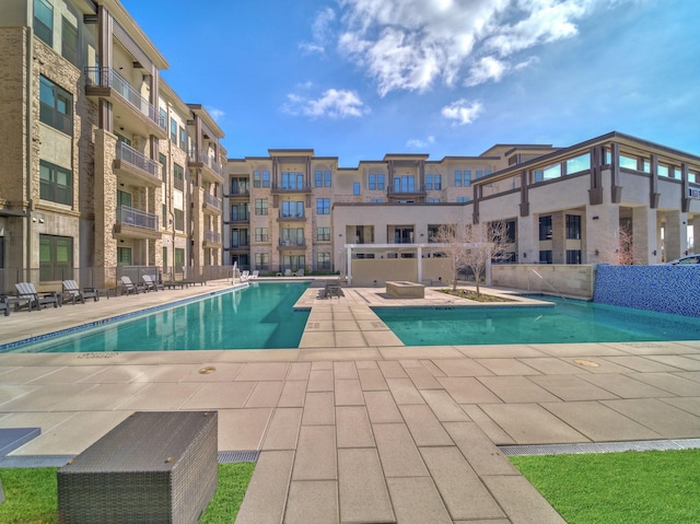 pool with a patio area