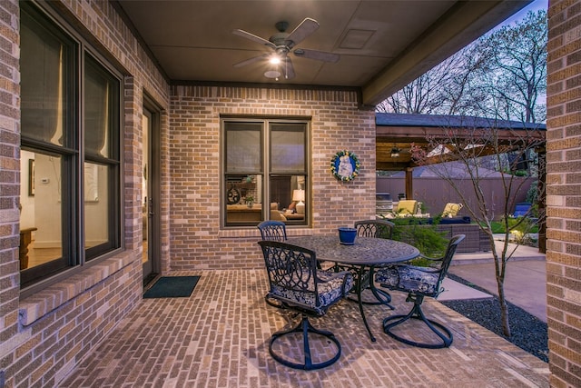 view of patio / terrace featuring a ceiling fan