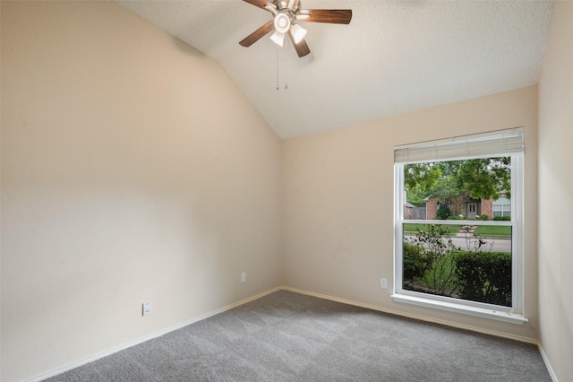 full bathroom featuring tile patterned flooring, a shower stall, a garden tub, vaulted ceiling, and double vanity