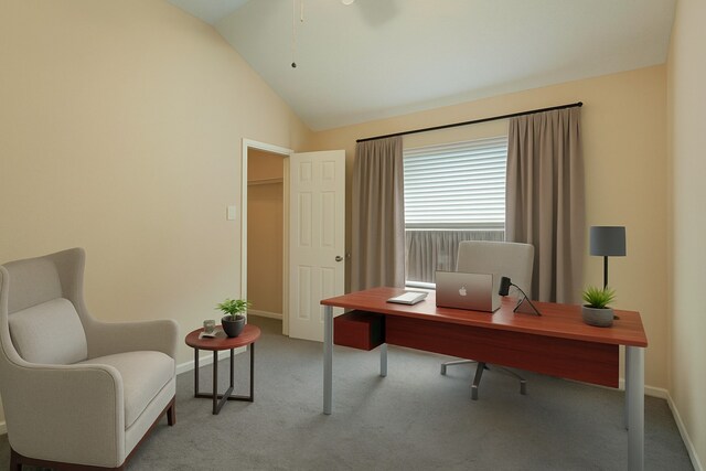 bedroom featuring light colored carpet, lofted ceiling, and baseboards