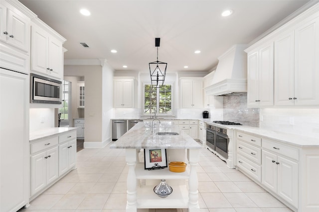 kitchen with open shelves, ornamental molding, custom range hood, a sink, and stainless steel appliances