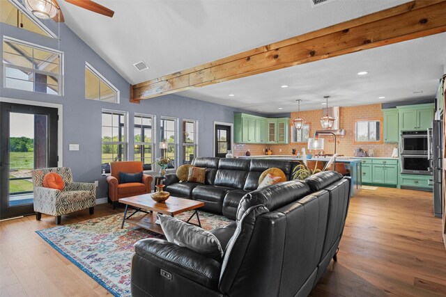 287 Vz County Road 3813, Wills Point, TX 75169 - living room featuring healthy amount of natural light, light wood finished floors, ceiling fan, recessed lighting, and beamed ceiling
