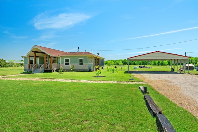 287 Vz County Road 3813, Wills Point, TX 75169 - view of front of home featuring driveway, a front yard, a porch, and a carport