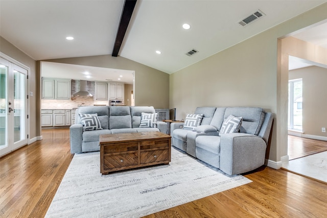 10907 Wonderland Trl, Dallas, TX 75229 - living room featuring vaulted ceiling with beams, visible vents, light wood-style flooring, and recessed lighting