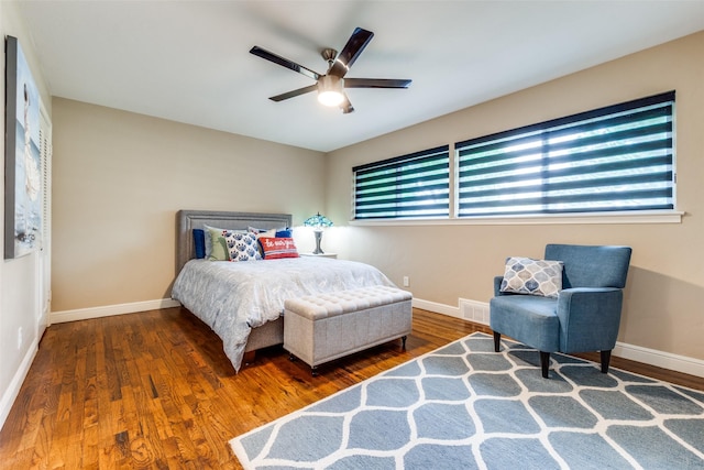 10907 Wonderland Trl, Dallas, TX 75229 - bedroom featuring baseboards, wood finished floors, and visible vents