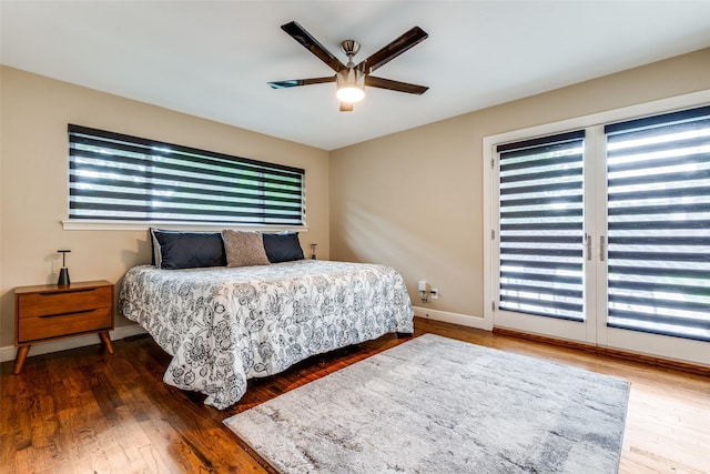 10907 Wonderland Trl, Dallas, TX 75229 - bedroom with baseboards, a ceiling fan, wood finished floors, and access to exterior
