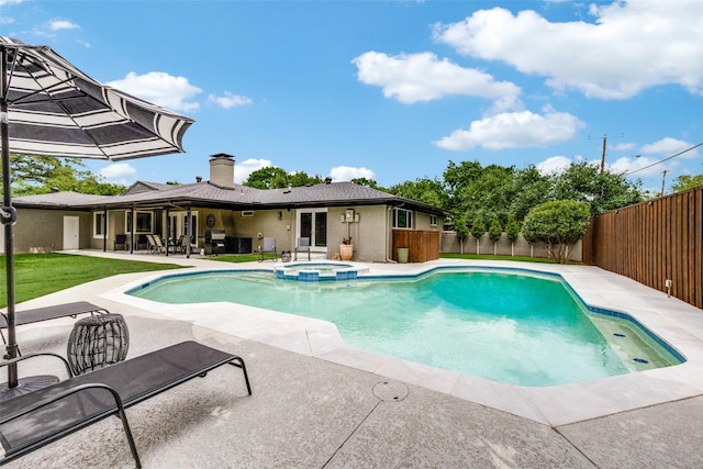 10907 Wonderland Trl, Dallas, TX 75229 - view of pool featuring a patio, a fenced backyard, a ceiling fan, and a pool with connected hot tub