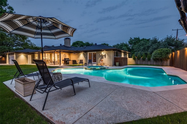10907 Wonderland Trl, Dallas, TX 75229 - view of swimming pool with a lawn, a pool with connected hot tub, a fenced backyard, and a patio area