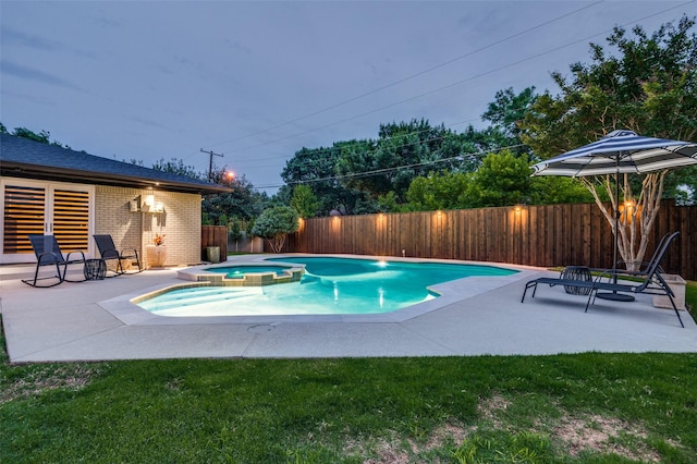 10907 Wonderland Trl, Dallas, TX 75229 - view of swimming pool featuring a fenced backyard, a pool with connected hot tub, and a patio area