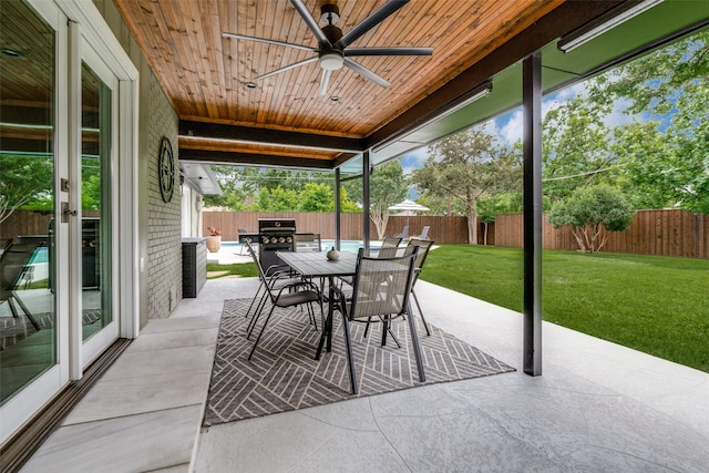 10907 Wonderland Trl, Dallas, TX 75229 - view of patio featuring a fenced backyard, outdoor dining area, and ceiling fan