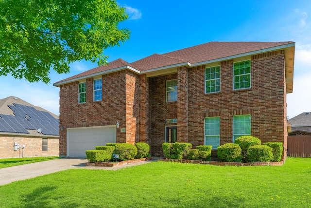 view of front of home with fence, a front lawn, brick siding, a garage, and driveway