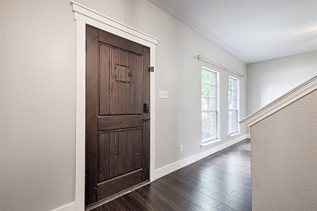 2620 Argyle Shore Dr, Rockwall, TX 75087 - entrance foyer featuring baseboards, a textured wall, and dark wood finished floors