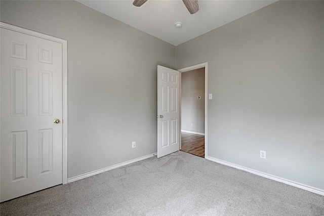 2620 Argyle Shore Dr, Rockwall, TX 75087 - unfurnished bedroom featuring carpet floors, baseboards, and a ceiling fan